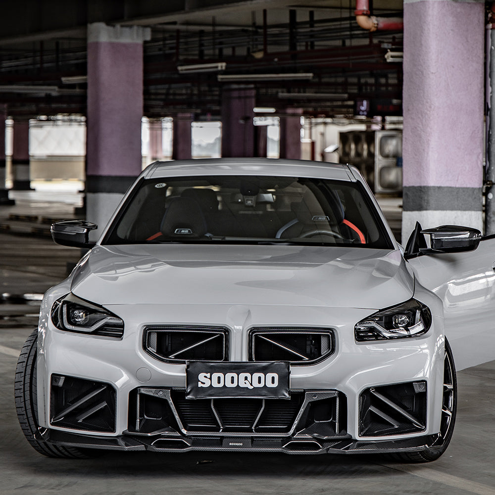 SOOQOO carbon fibre Front Grille V1 installed on BMW M2 (G87), straight front view on white car