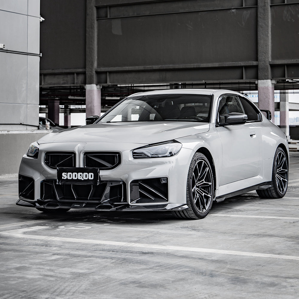 SOOQOO carbon fibre Front Splitter V1 installed on BMW M2 (G87), front three-quarter wide view
