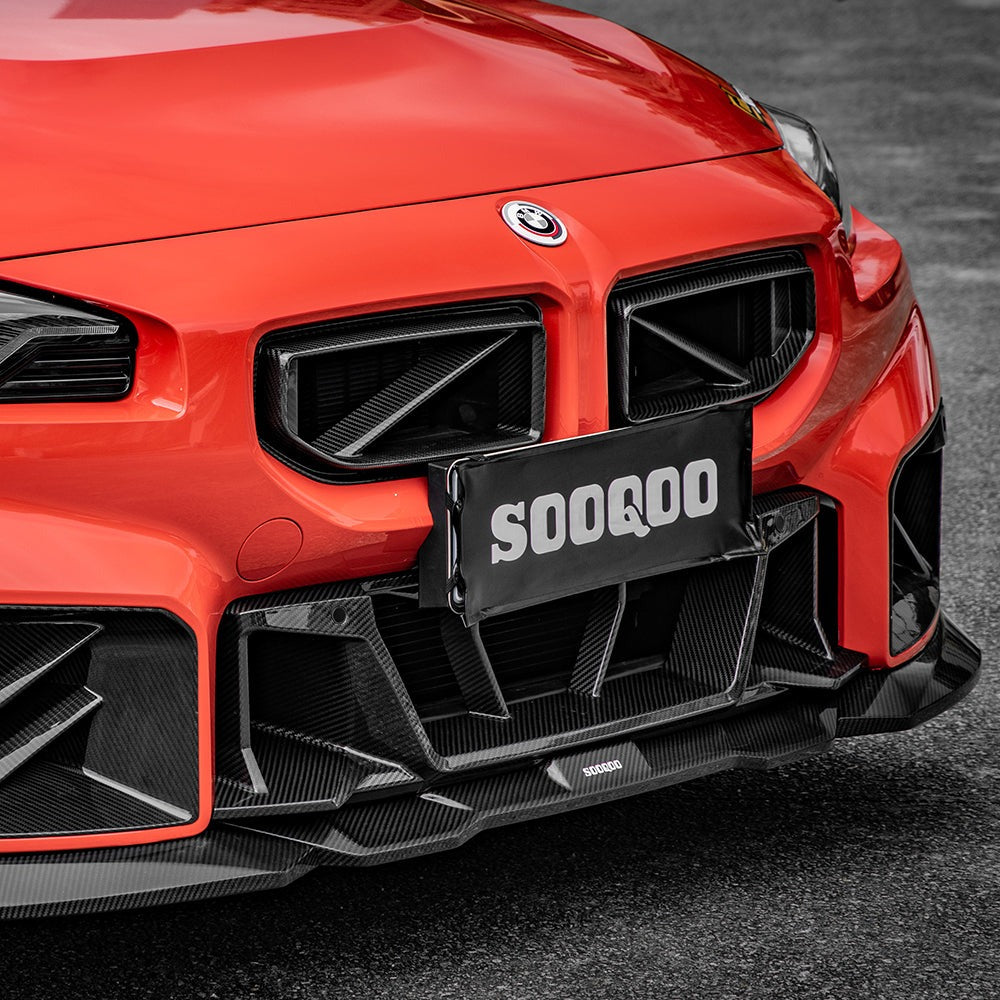 SOOQOO carbon fibre Front Splitter V2 installed on BMW M2 (G87), front three-quarter close-up