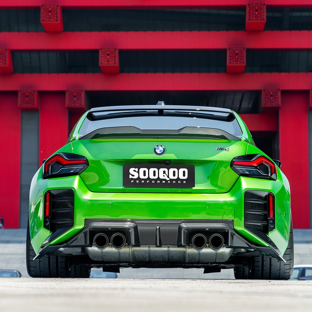 SOOQOO carbon fibre Rear Diffuser V2 installed on BMW M2 (G87), straight rear view on green car