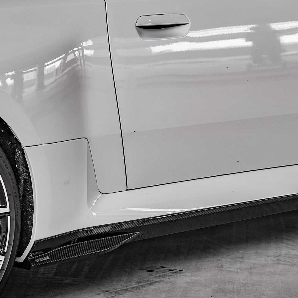 SOOQOO carbon fibre side skirts installed on BMW M2 (G87), side profile view on white car