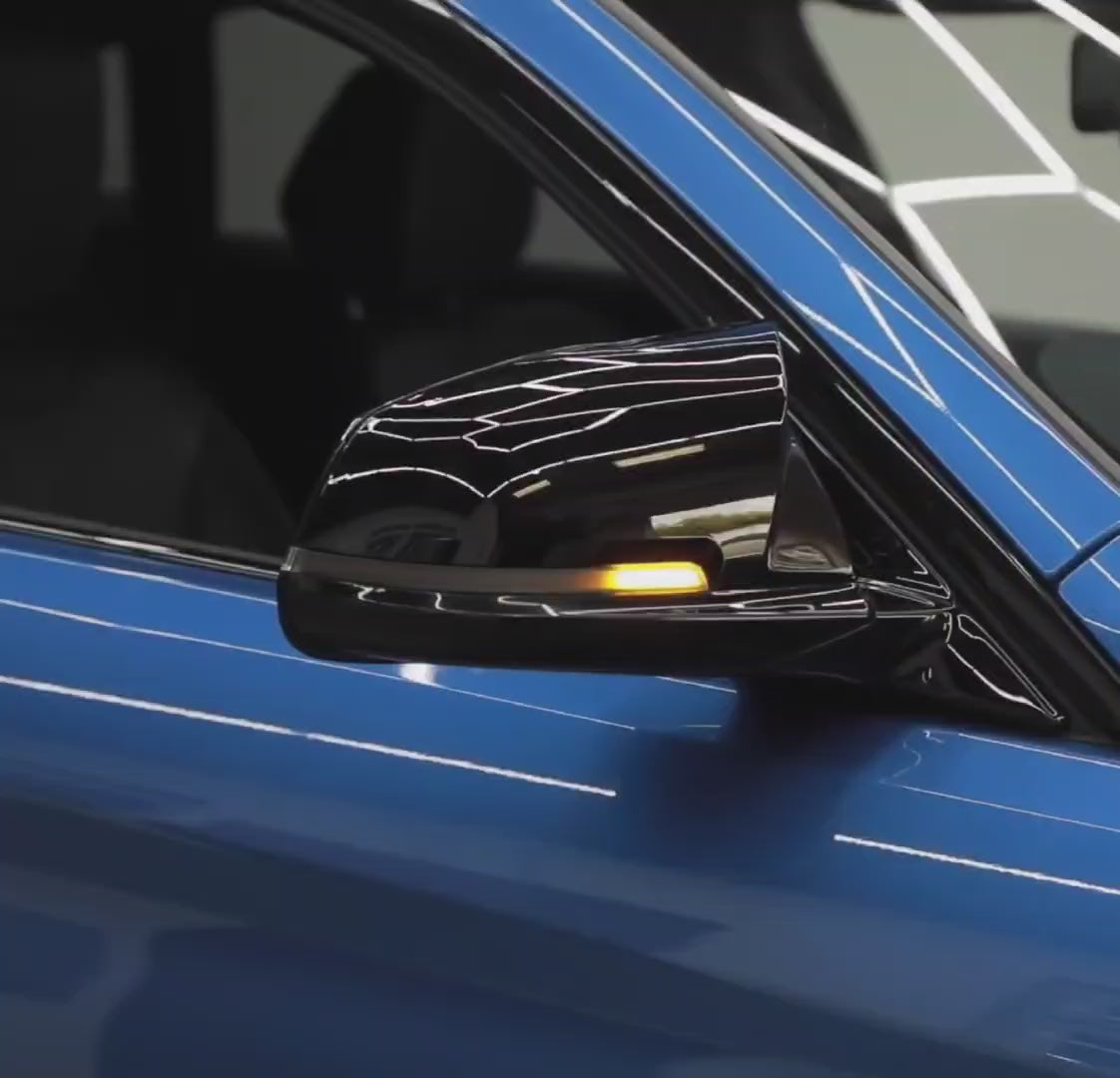 Video showing dynamic wing mirror indicators for BMW F series functioning.