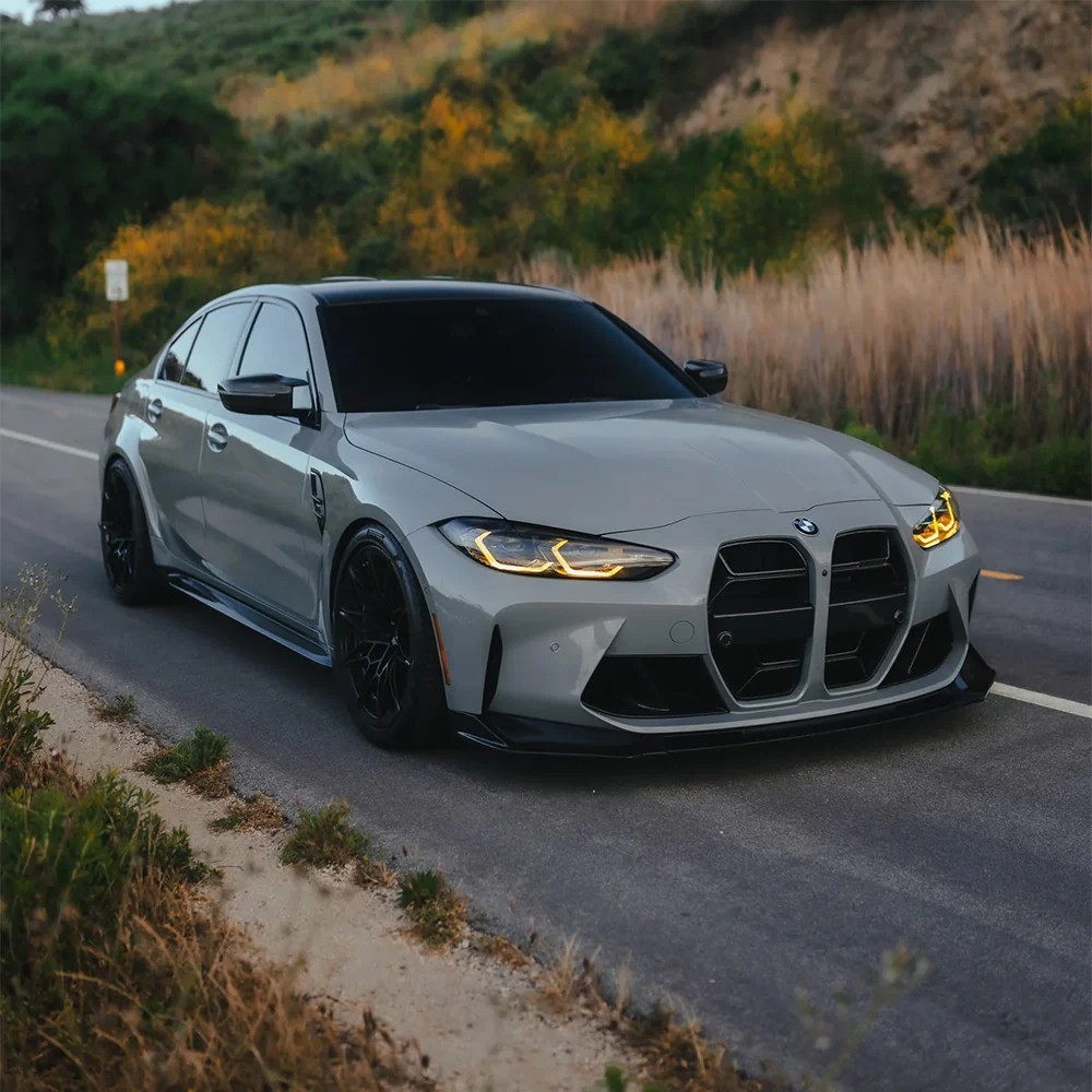 BMW M3 G80 with carbon fibre front splitter, side skirts, and rear diffuser