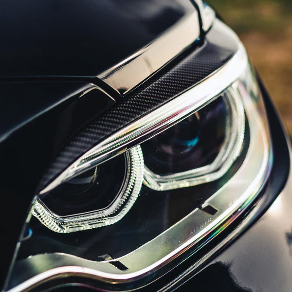 BMW M2 F87 with Carbon Fibre Headlight Eyelids Installed - Side View