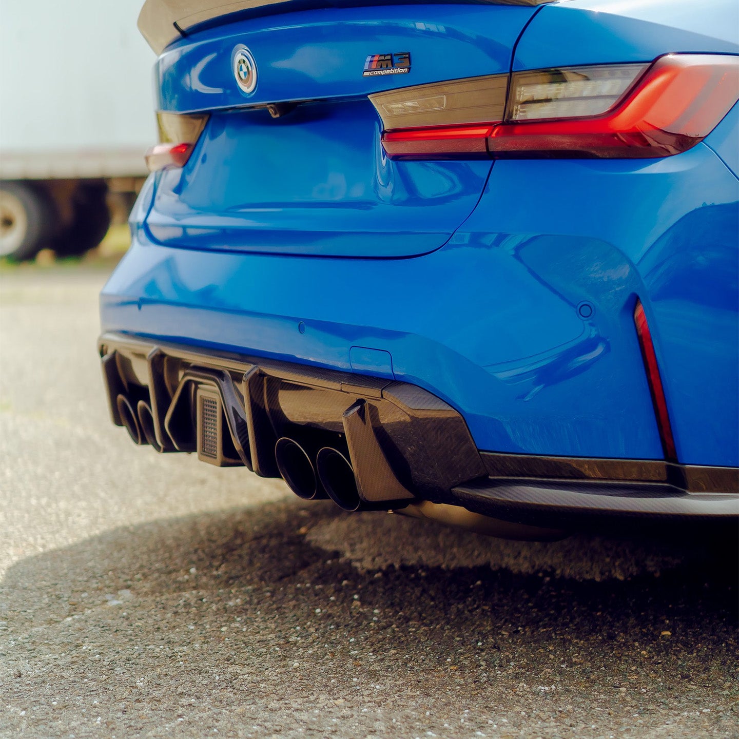 BMW M3 & M4 G80/G82/G83 with Carbon Fibre F1 Brake Light Rear Diffuser Installed - Side View