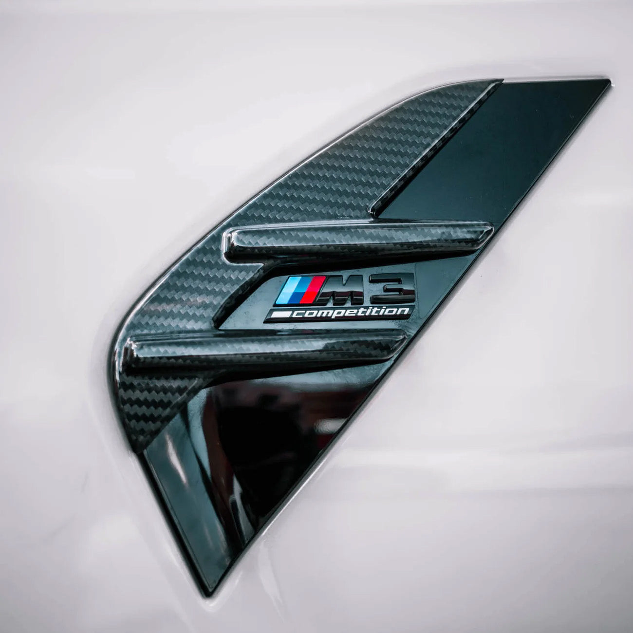 BMW M3 & M4 G80/G82/G83 with Carbon Fibre Fender Trim Installed - Side View