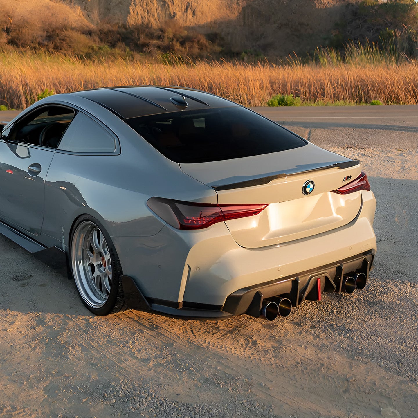 BMW M3 & M4 G80/G82/G83 with Carbon Fibre Noire LED Rear Diffuser Installed - Side View