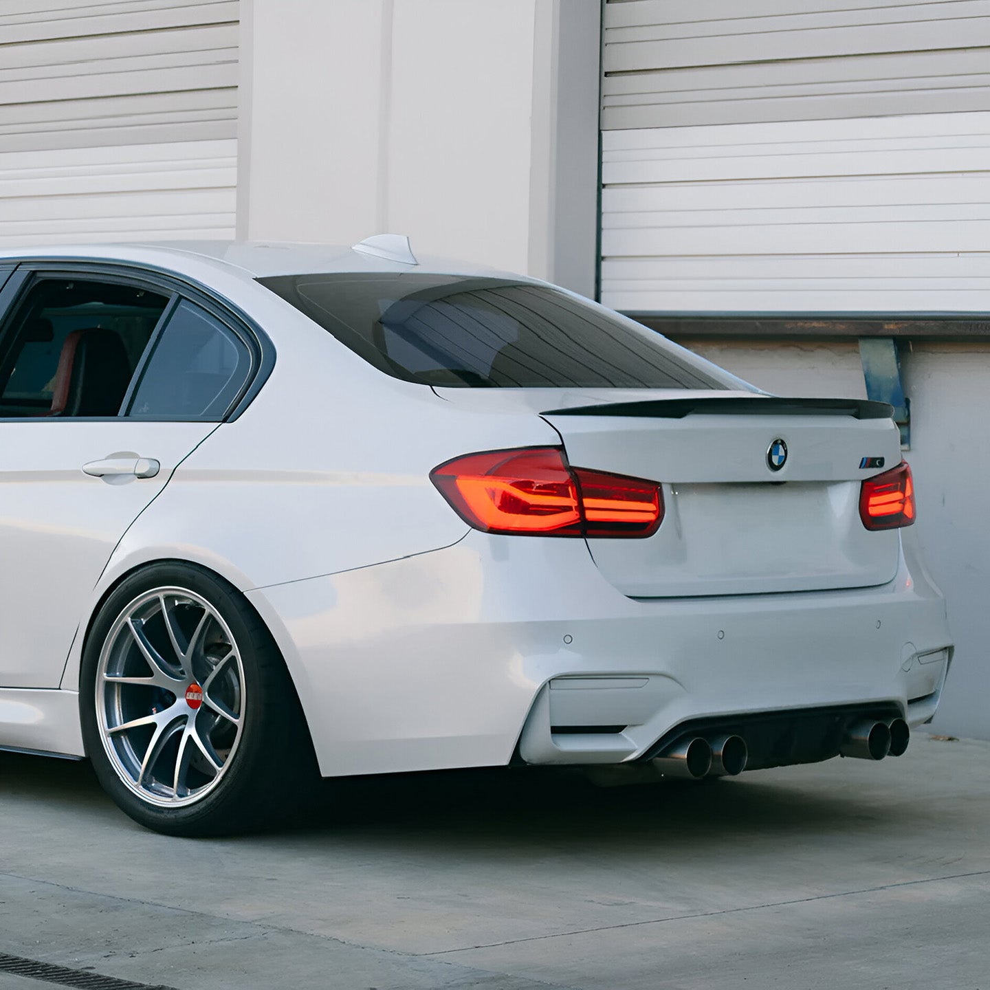 BMW M3 F80 with Carbon Fibre OEM+ Rear Spoiler Installed - Side View