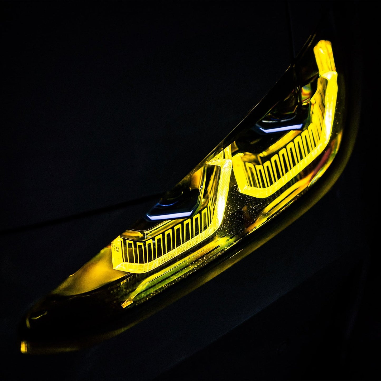 Dark View of CSL Yellow Daytime Running Lights on BMW M4 G82