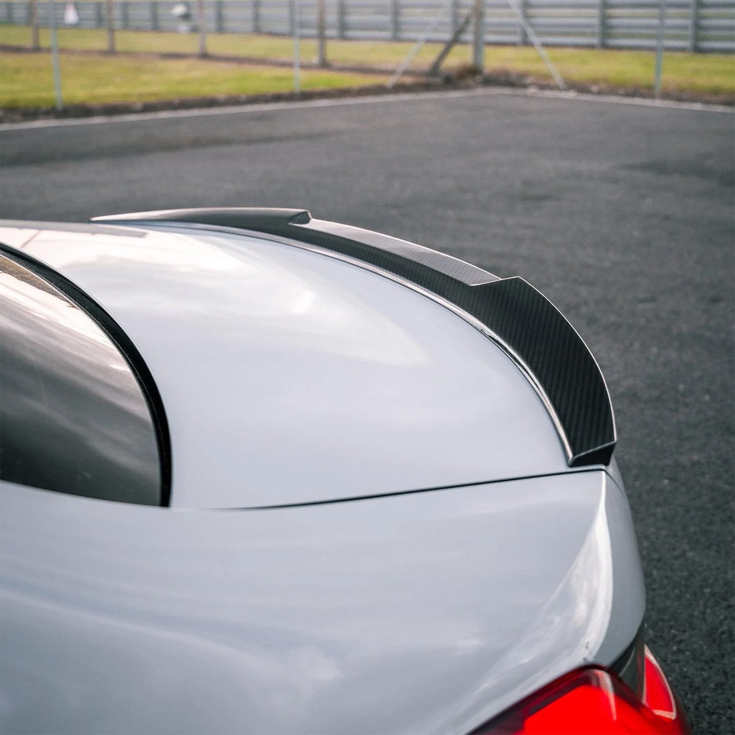 BMW M3 G80 with Carbon Fibre 'M4 Style' Rear Spoiler Installed - Side View