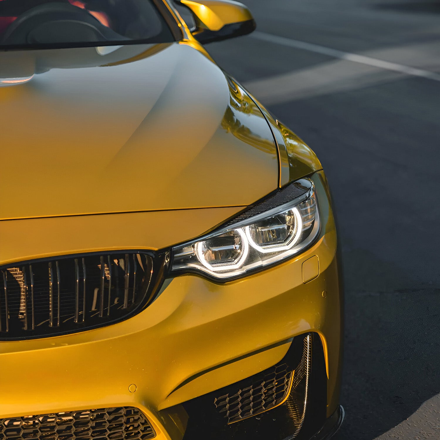 BMW M3 F80 with Carbon Fibre Headlight Eyelids Installed - Front View