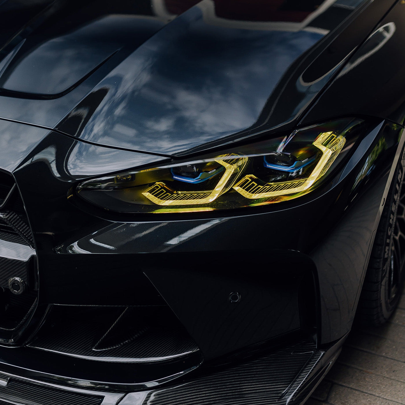 Close-Up of CSL Yellow Daytime Running Lights on BMW M4 G82