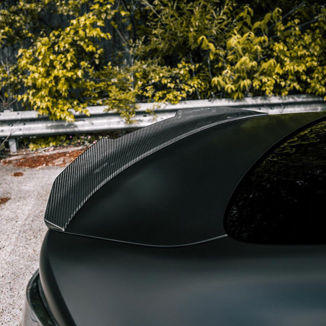 BMW M4 G82 with Carbon Fibre Ducktail Rear Spoiler Installed - Side View