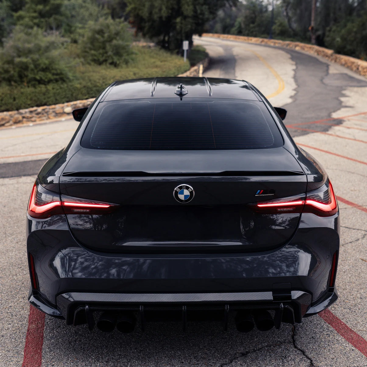 BMW M4 G82 with Carbon Fibre OEM+ Rear Spoiler Installed - Rear View