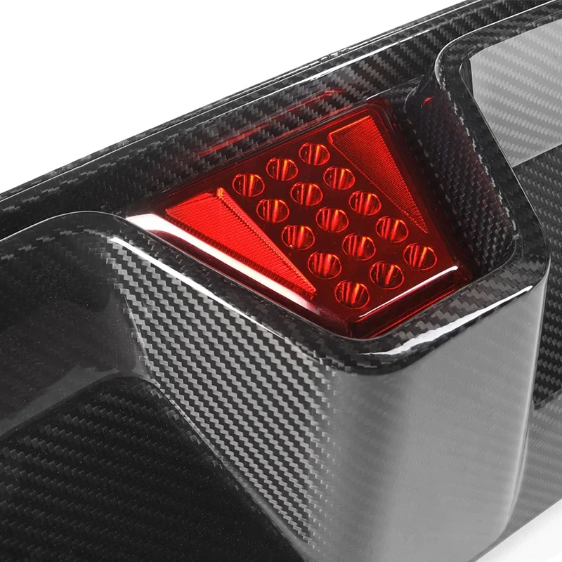 Close-Up of Carbon Fibre CS LED Rear Diffuser for BMW M5 (F90) - Detailed View