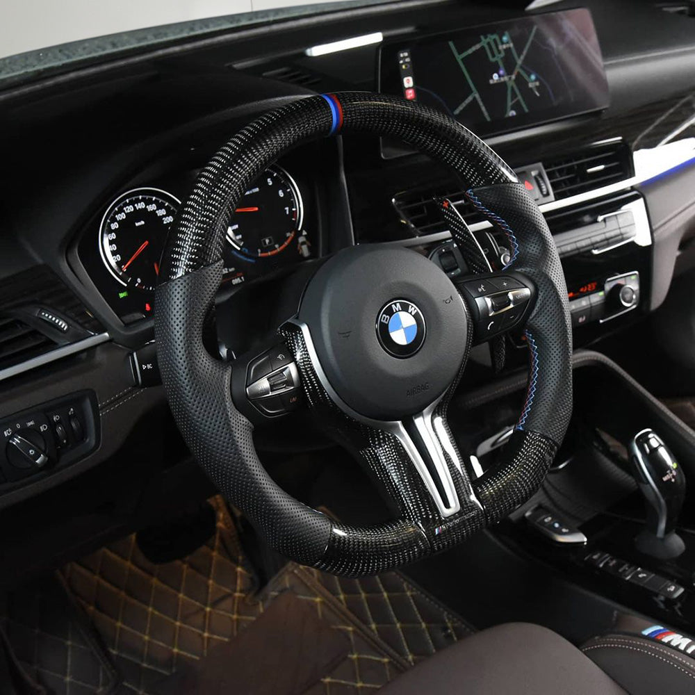 Side View of BMW F82 with Custom Carbon Fibre Steering Wheel Installed