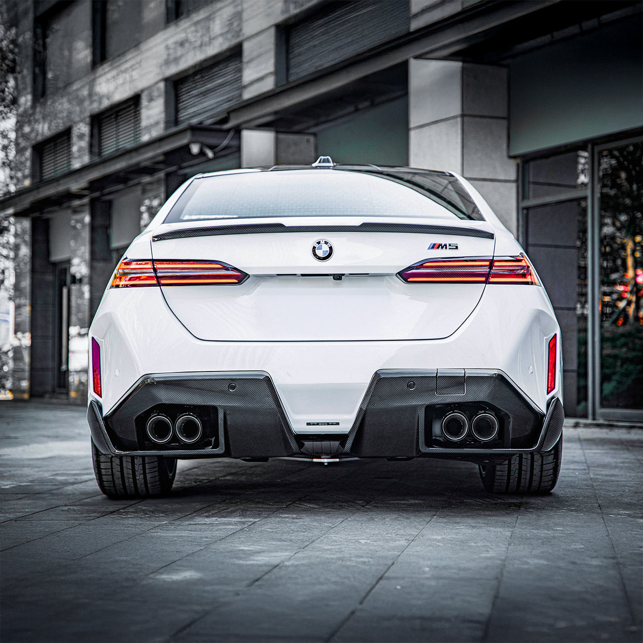 BMW M5 G90 with Carbon Fibre M Performance Rear Diffuser Installed - Rear View