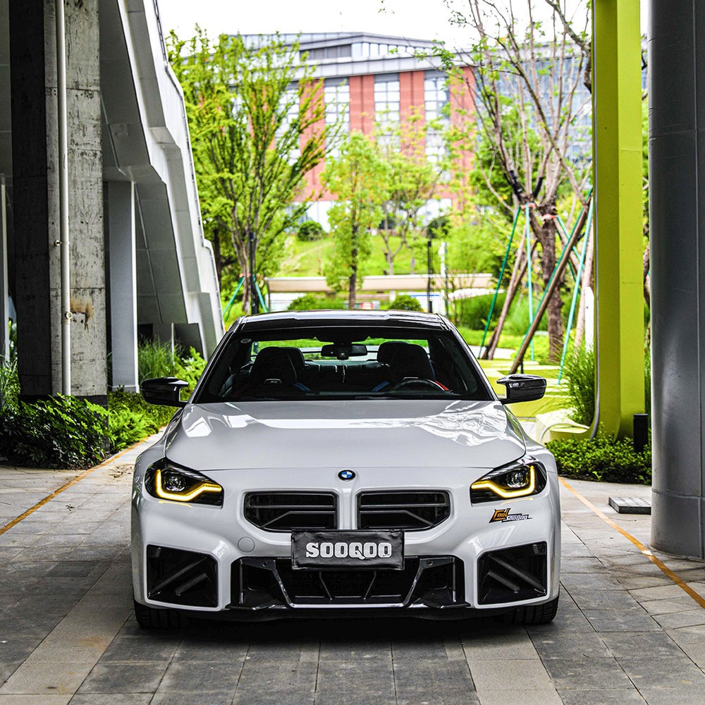SOOQOO carbon fibre Front Grille V2 installed on BMW M2 (G87), straight front outdoor view