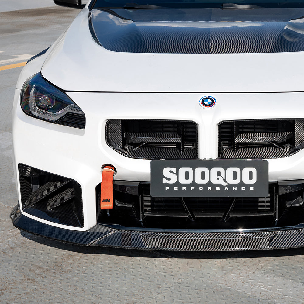 SOOQOO carbon fibre Front Splitter V3 installed on BMW M2 (G87), straight front outdoor view
