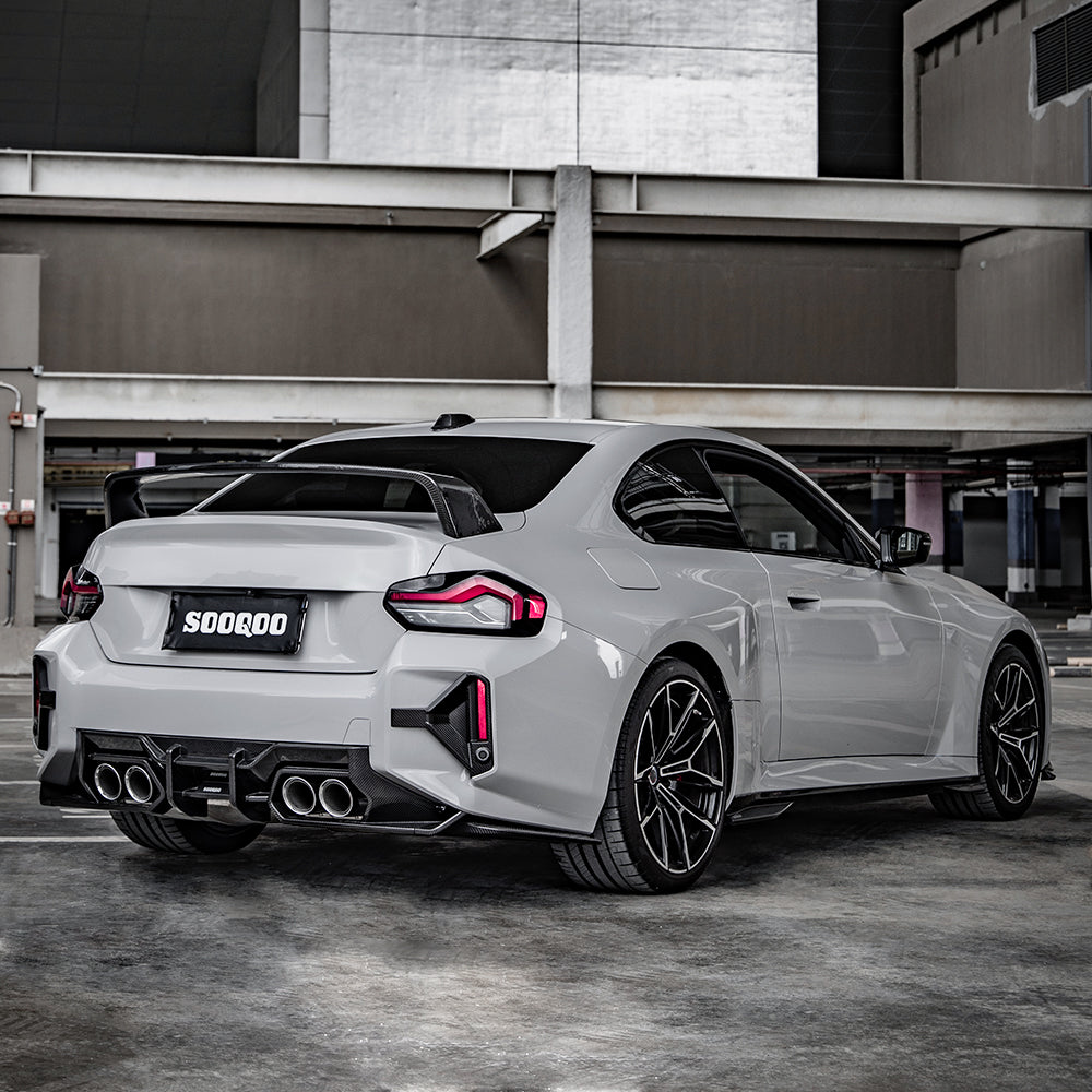SOOQOO carbon fibre Rear Diffuser V1 on BMW M2 (G87), rear three-quarter wide view