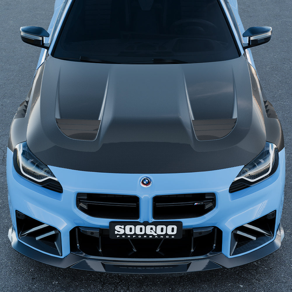 SOOQOO carbon fibre vented bonnet installed on BMW M2 (G87), top-down view showing vent layout
