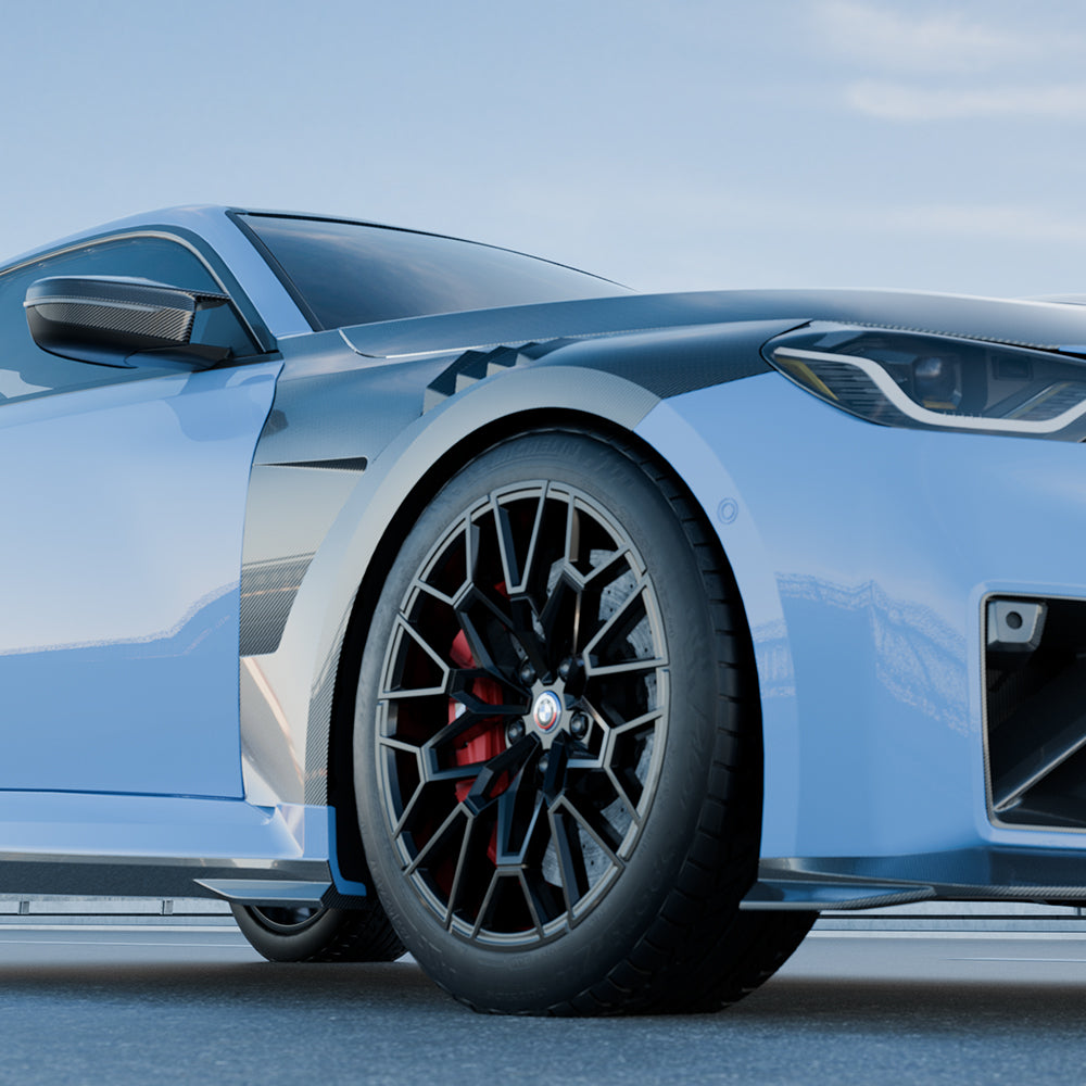 SOOQOO carbon fibre vented fenders installed on BMW M2 (G87), front wheel close-up on blue car
